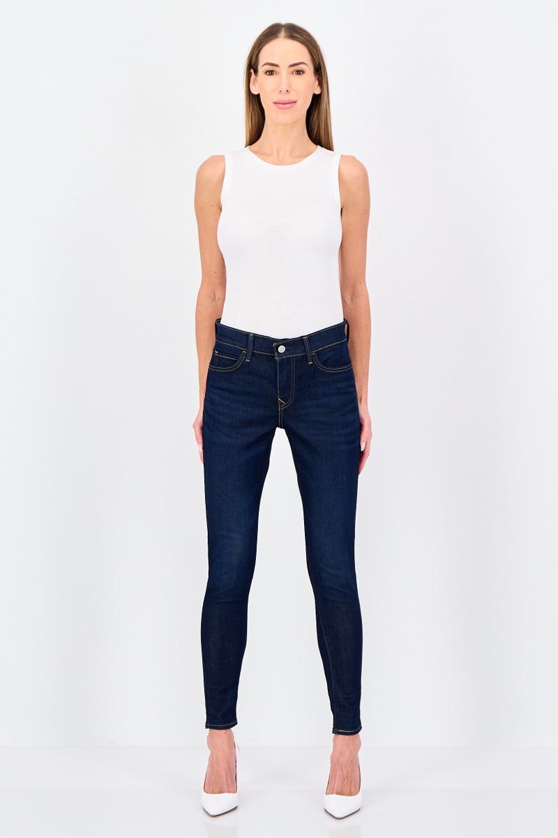 Levi's جينز نسائي ضيق جداً بخصر متوسط قابل للتمدد، أزرق داكن - Image 4